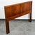 Handsome and timeless mid century modern queen size headboard by Dixie furniture crafted from wood with a rich finish....