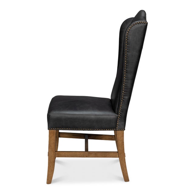 Top-grain leather covers winged backs that stand 46 inches high, giving these seats the scale of traditional host chairs....
