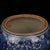 Charming small Chinese blue ground porcelain ginger jar with fitted lid, decorated with classic reserved white plum...