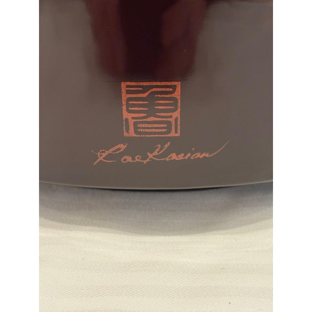 Nice Korean designer Rae Kasian dark brown lacquered drum or barrel shaped table lamp. Signed in red with designer's name....