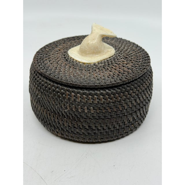 A wonderful hand made basket by the Inuit master Joe Sikvayugak of Barrow Alaska. It is signed and dated on the interior...