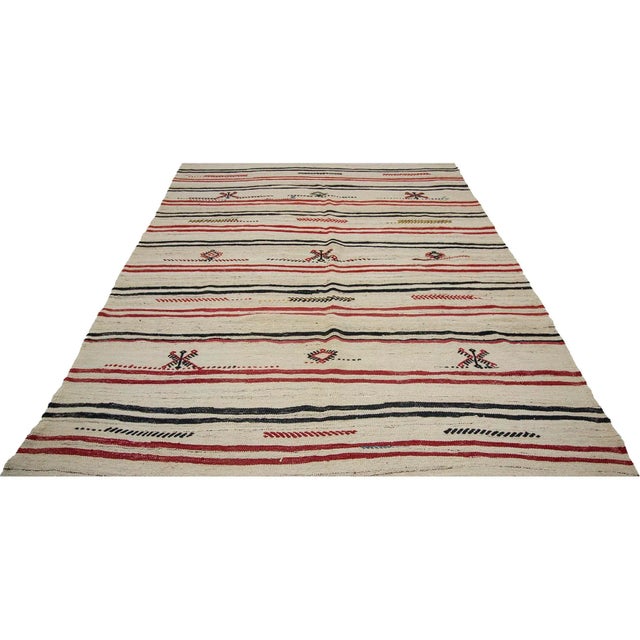 Striped vintage kilim rug from Afyon region of Turkey. Approximately 50-60 years old. In very good conditon