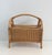 This nice magazine rack is made of rattan. This is a French work. Circa 1970