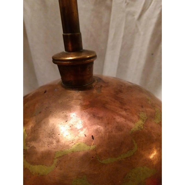 This hand made copper/brass shows elegance and true craftsmanship while keeping the old moonshine days fill. The lamp has...