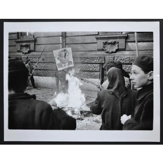Hungary Uprising in Back a Fire with a Poster of Istvan Dobi, 1956 For Sale