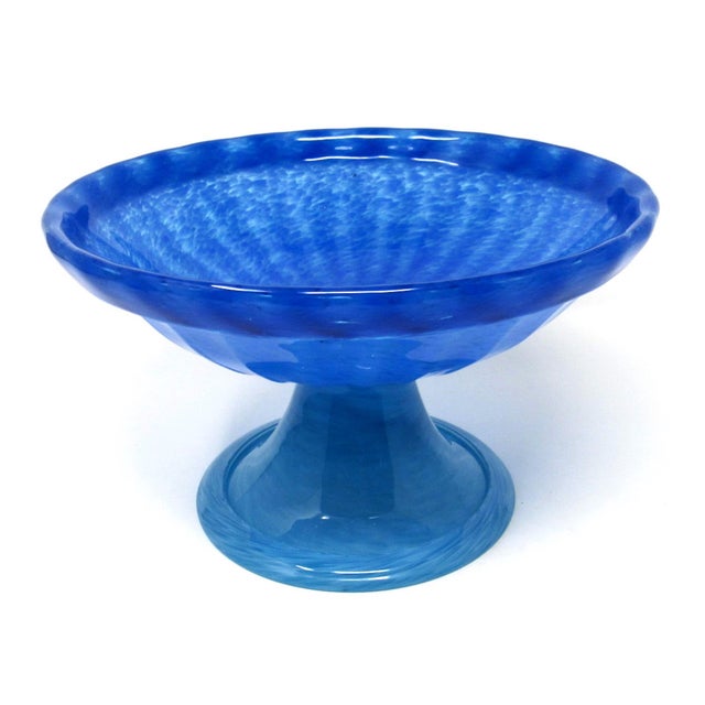 A gorgeous glass pedestal fruit bowl. Measuring 9.5" in diameter and 6" tall, this bowl features a mesmerizing feathered...