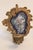 A rare find. Designer Barry Goralnick bought these carved-wood sconces, hand-painted with a subtle floral design, from...