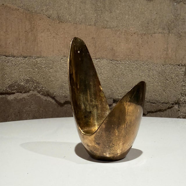 For your consideration, an abstract mid-century modern candle holder. Its organic, flame-like design is characteristic of...