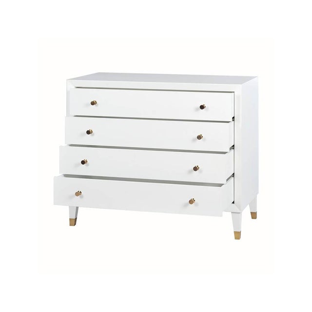 With four spacious drawers, this chest provides ample storage space for all your essentials. The polished brass hardware...