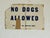 Mid-Century Modern Vintage No Dogs Allowed Distressed Sign For Sale - Image 3 of 3
