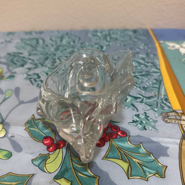 While often used as a votive candle holder, this organic, shell free-form glass piece could also be used as a small...