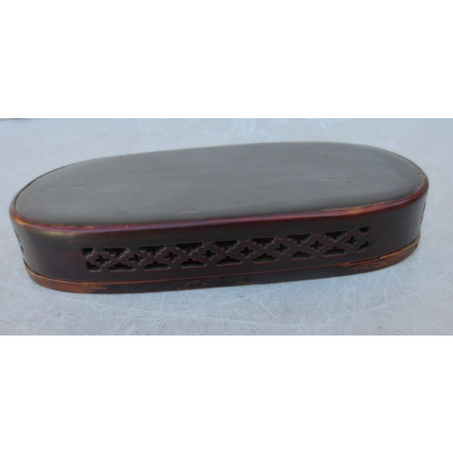 Fine carved wooden personal box. Pierced Chinese fretwork around the sides and ends and fitted to close in a top and...