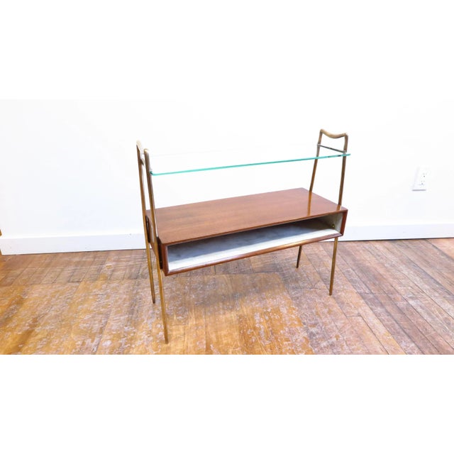 Midcentury Italian tiered side table. Italian tiered side table with parchment lined interior. Makore wood box having a...