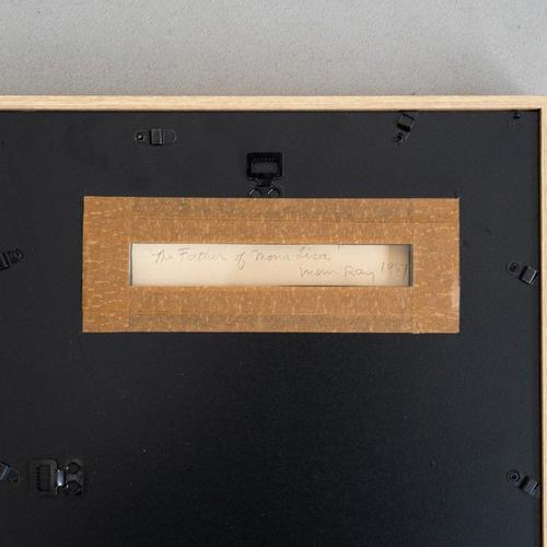 This exceptional lithograph by man ray, titled "the father of mona lisa," is a distinguished piece from the portfolio...