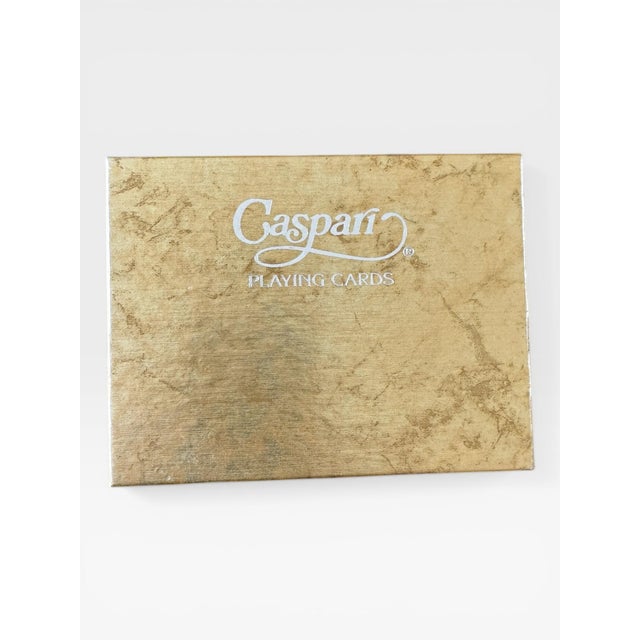 A double deck of bridge playing cards by Caspari, featuring the Sea Fans design by artist Janine Moore. The set includes...