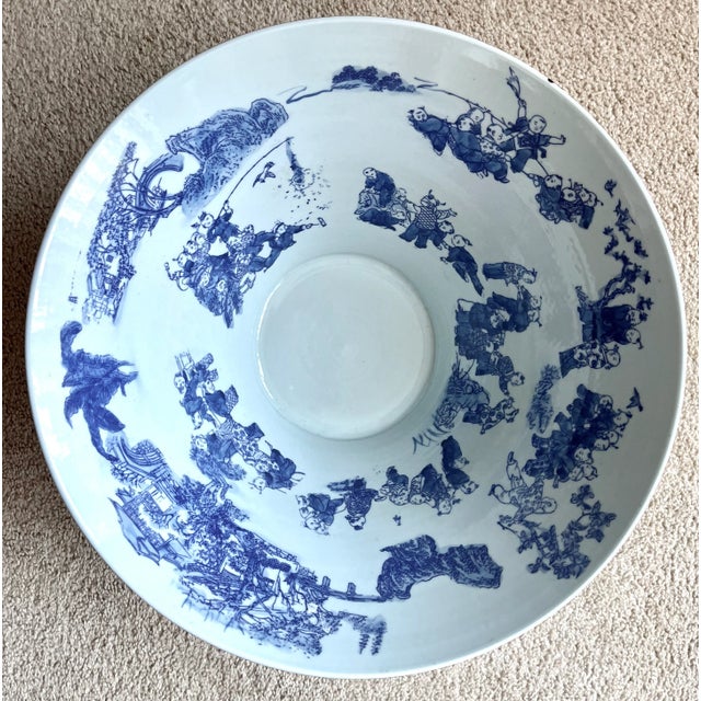 This fabulous large centerpiece or punch bowl features Blue & White classic figures on the interior and a dramatic Black...