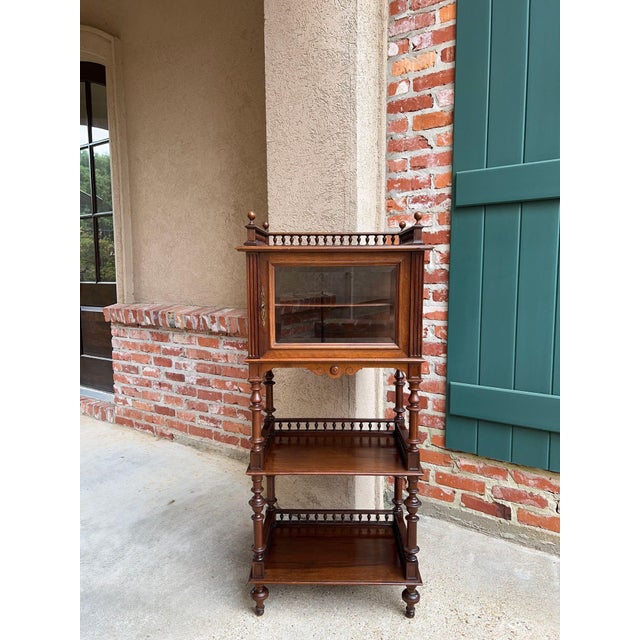 Antique English Display Cabinet Narrow Bookcase Étagère Glass Walnut c1920. Direct from England, a beautiful narrow...