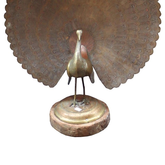 Dimensions: 18" W x 5" D x 19" H Features: • A rare piece and one of its kind exists • Vintage peacock statue • 100% brass...