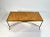 Coffee table by Maison Baguès in gilt bronze, white original marble top. Since its establishment in 1860, the Maison...
