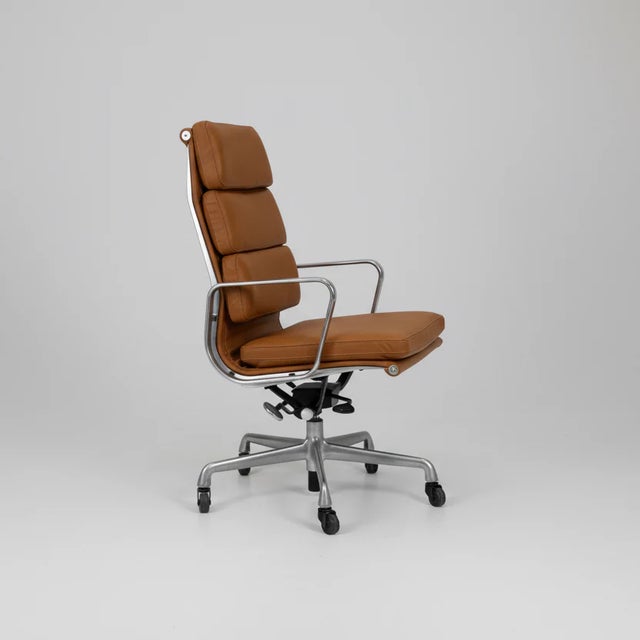 A refined Mid-Century Modern icon, this Eames Aluminum Group Executive Chair by Herman Miller, originally designed by...