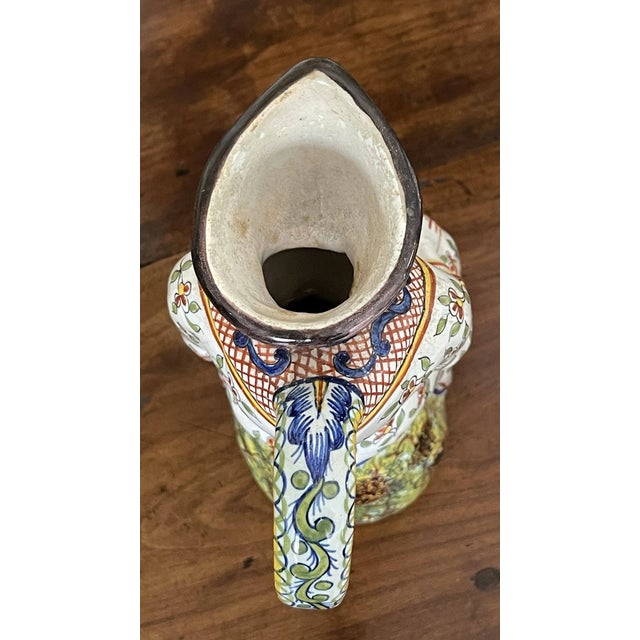 French Faience Figural Jug the unglazed underside with the 17th-century mark "F.C", possibly Marseilles, in the form of a...