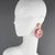Just lovely! These clip-on earrings were designed and hand-crafted by Cilea Paris. The oversized dangle shape features...