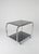 Vintage Chrome and Smoked Glass 2-Tier Coffee Table on Casters, 1970s, in Good conditions. Designed 1970 to 1979