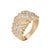 Stylish vintage diamond cigar ring (circa 1980s) crafted in 14 karat yellow gold. Mixed cut diamonds total an estimated...