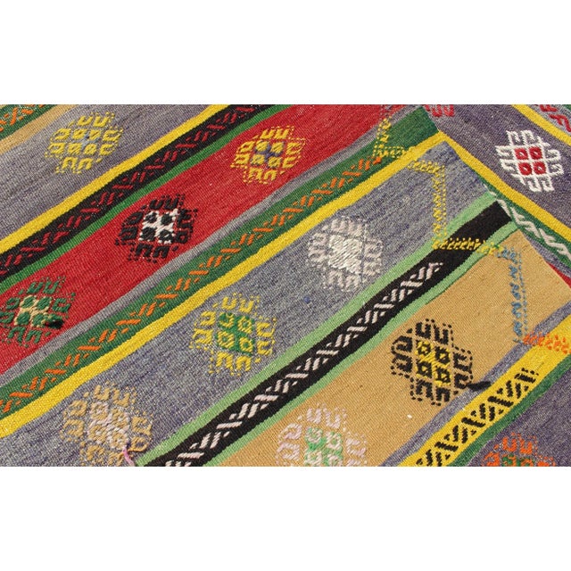 Textile Mid 20th Century Colorful Large Turkish Kilim Carpet With Striped Geometric Shapes Design For Sale - Image 7 of 12