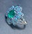 Modern 1.5 Carat Natural Oval Cut Emerald Ring With Blue Topaz & Amethyst 14 Karat Gold For Sale - Image 3 of 8