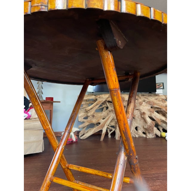 Mid century tortoise color bamboo folding table. This is a great heavy bamboo table with folding legs or easy set up.The...
