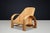 Sculptural Italian Bamboo and Rattan Lounge Chair, Italy, 1970s A striking sculptural lounge chair crafted from bent...