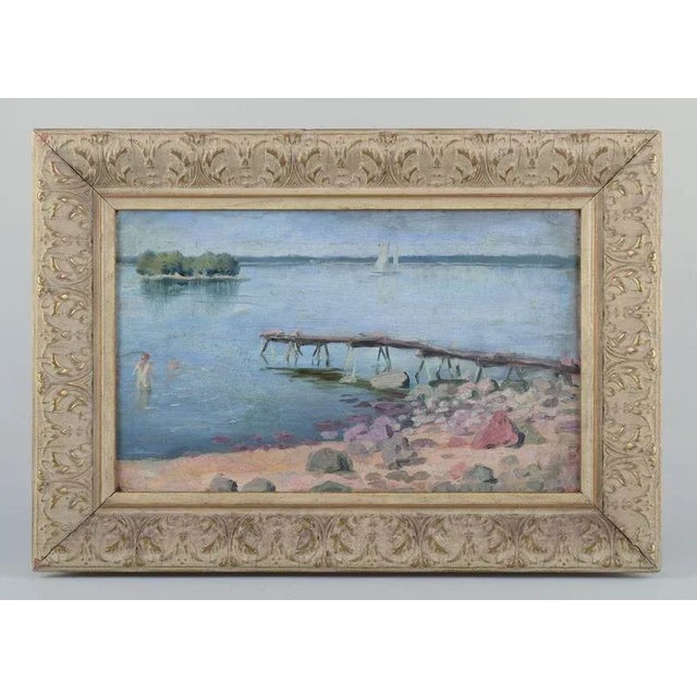 Garibaldi Lindberg (1863–1957), listed Swedish artist. Oil on canvas mounted on board. Bathing child at a bathing jetty,...