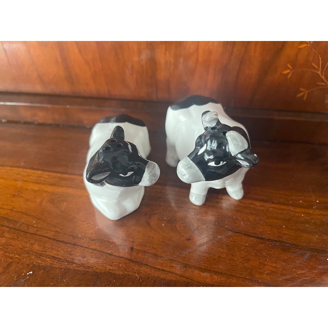 Cute pair of cow salt and pepper shakers.