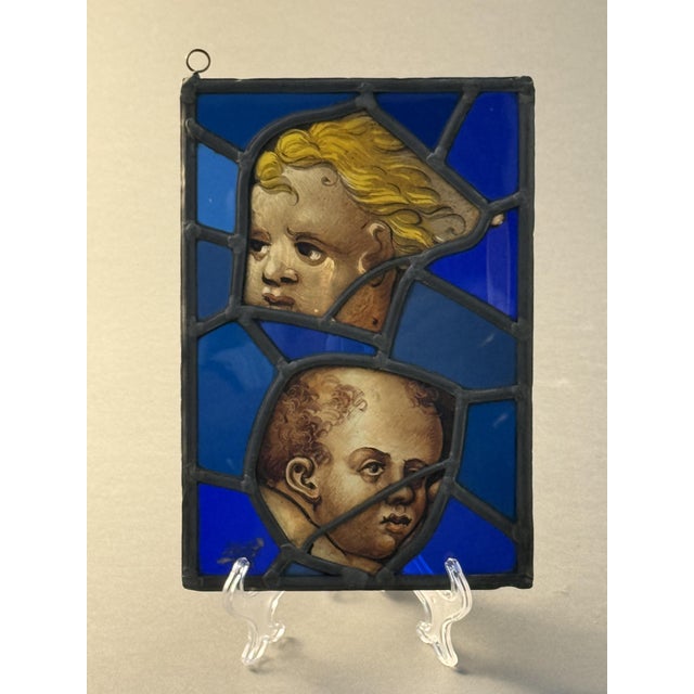 Fragments of 16th-century stained-glass windows. There are three glass panels in total, in which fragments of 16th-century...