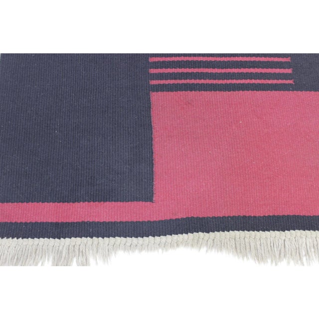 - This rug was made in former czechoslovakia - It features a black and dark pink geometric pattern - It is double-sided...