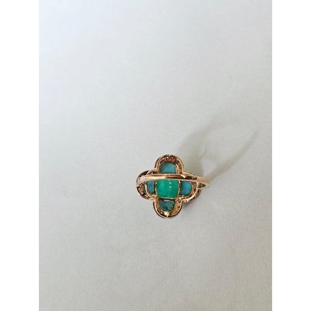 A very gorgeous and beautiful, Art Deco style, Emerald & Turquoise Engagement Ring set in 18K Rose Gold & natural...