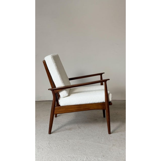 Afromosia Armchair by Dennis Young for George Stone, 1960, in Flawless conditions. Designed 1960 to 1969 This piece is...