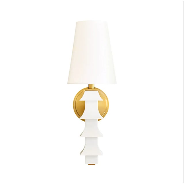 Powder caoted Tole Pagoda wall sconce in white. An Asian inspired contemporary wall sconce, the Sedona is perfect for...