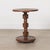 Petite carved wood table by Charles Dudouyt, made in France, 1940s. Thick carved wood block stem with circular top and...