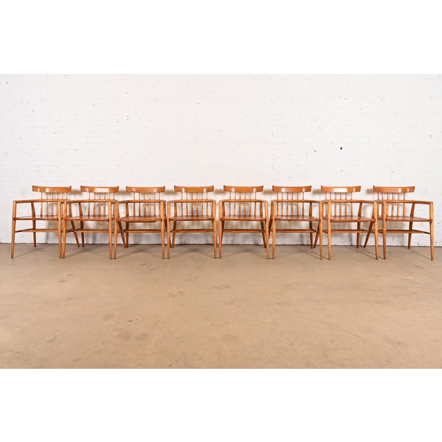 An exceptional set of eight iconic Mid-Century Modern spindle back dining chairs or armchairs By Paul McCobb for...