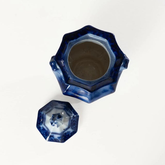 A wonderful 19th Century flow blue sugar bowl.