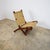We offer this rare Mexican folding chair by Muebles Toluca, circa 1960. Made in solid cedar wood and natural palm cords.