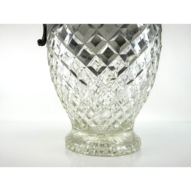 Vintage cut glass ice bucket featuring a richly textured diamond-cut body paired with a fitted pewter lid and sculptural...