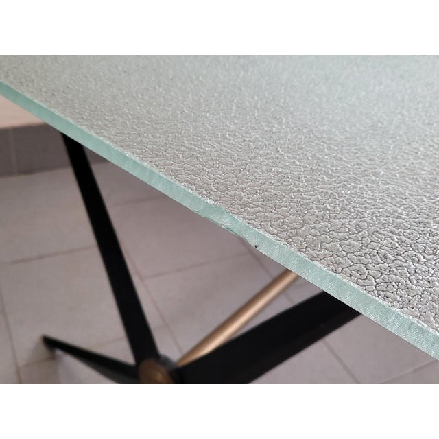 Mid-Century Coffee Table in Steel by Angelo Ostuni, 1950s, in Good conditions. Designed 1950 to 1959 This piece is...