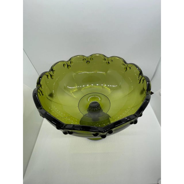 Enhance your decor with this stunning vintage footed compote bowl, showcasing the iconic Garland Tiara pattern by the...