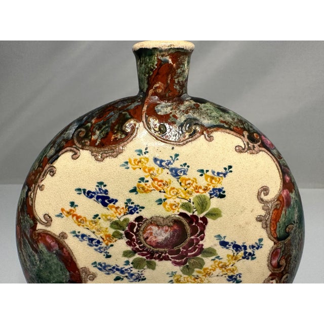 Japanese Hand Painted Flambe Glazed Moon Flask for your consideration. The vase measures approx. 6 3/8 inches tall, 5...