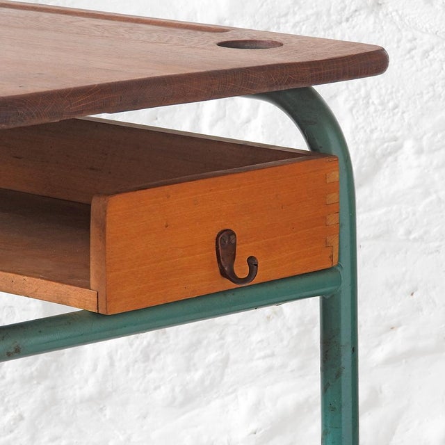 Vintage children's desk. Tubular metal frame with original mint turquoise paint (RAL 6033, green with a hint of blue),...