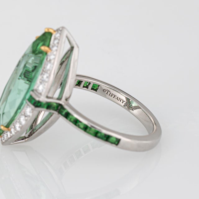 Pre-owned estate Tiffany & Co green tourmaline, diamond & tsavorite garnet cocktail ring crafted in 950 platinum & 18k...