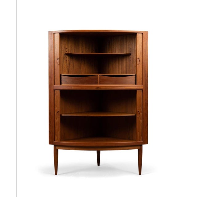 High-quality mid-century Danish corner bar and storage cabinet, designed for single malt or liquor collections. Features...